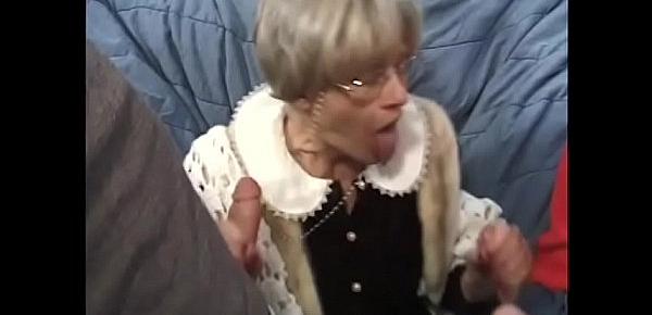  Horny granny Kathy Jones knows pretty well how to handle gang bang